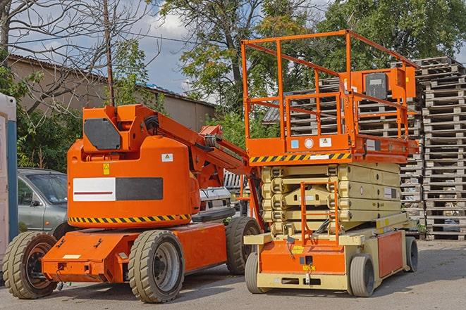 forklift moving inventory in warehouse setting in Simsbury